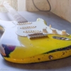graffiti yellow guitar vernice
