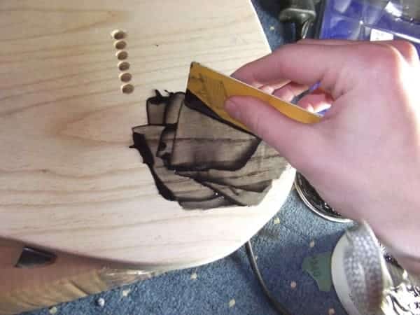How to fill the pore of the guitar