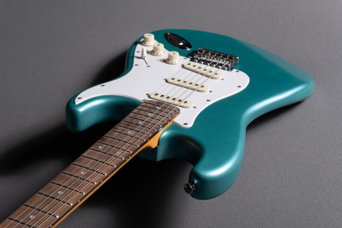 Teal green guitar